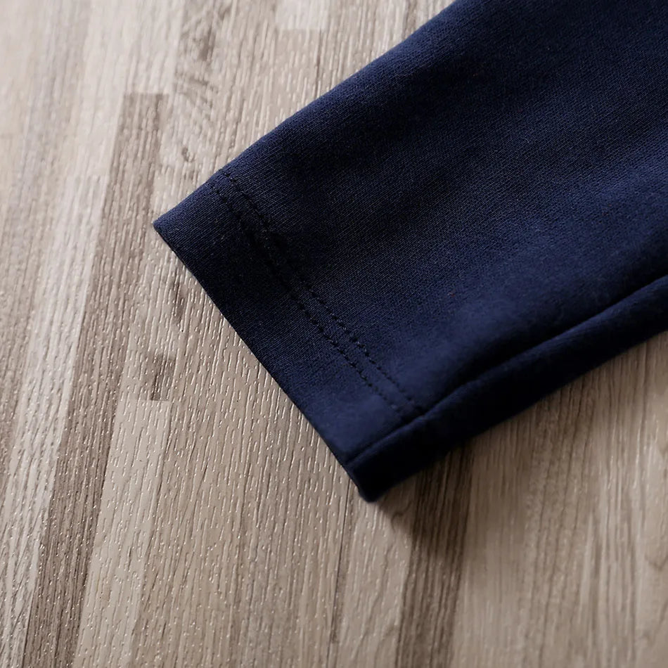 Baby anime romper navy fabric detail showing smooth texture