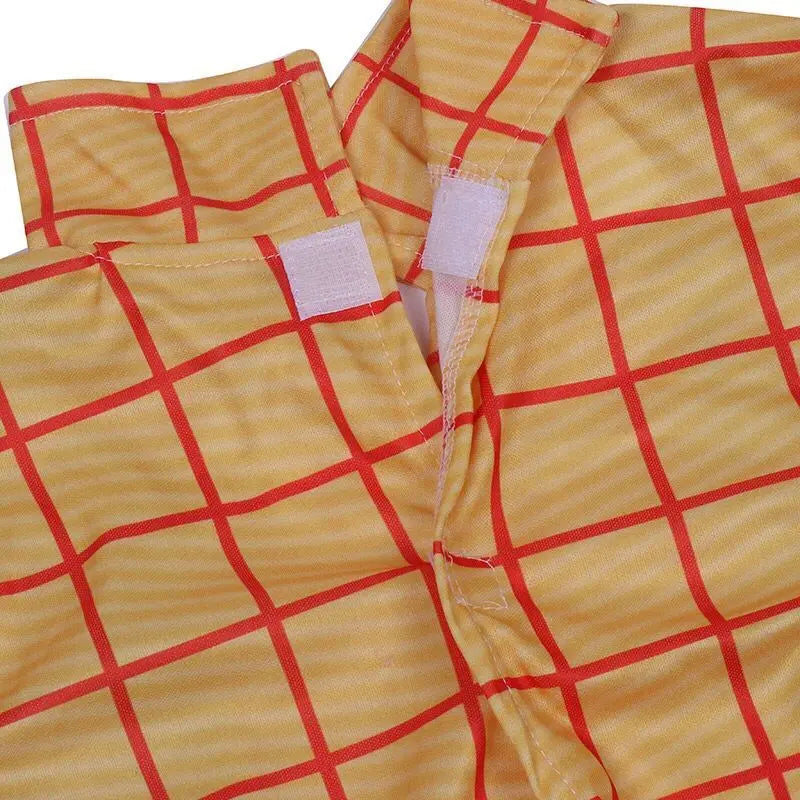 Woody cowboy costume vest detail with cow print and sheriff badge