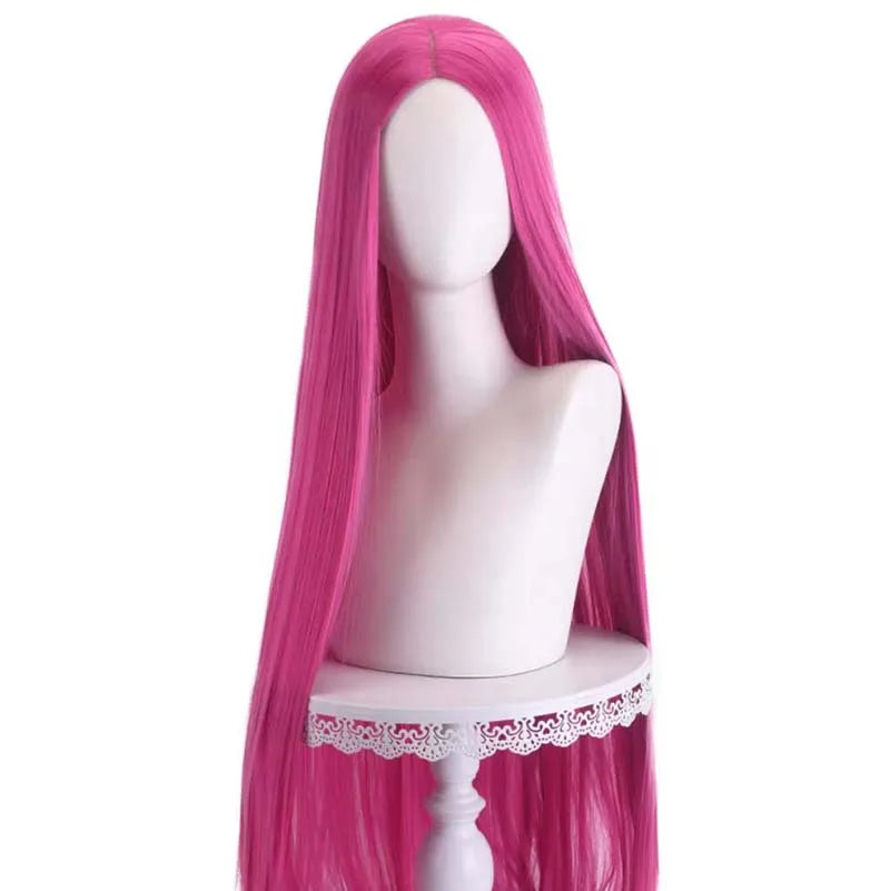 Long pink synthetic wig displayed on a wig stand