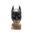 Batman latex mask in black, front view with pointed ears and facial details