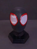Spider-Man adult mask front view in gray and black with smooth surface